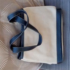 Cutter and buck purse measures 9by12". Excellent condition